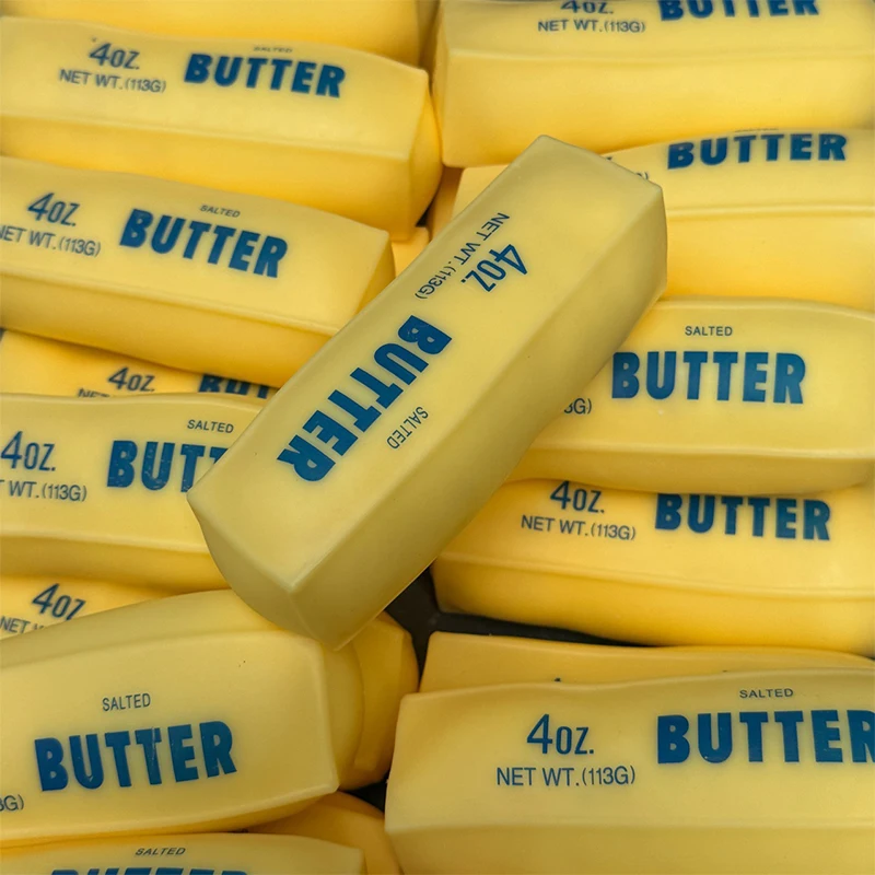 Butter-Stick-Quetschball, Stre – Novelty Gifts Bewertung und Preis